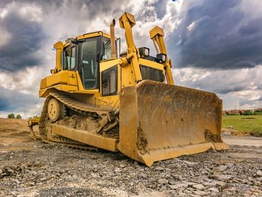 Large, yellow bulldozer.